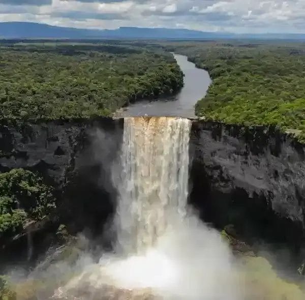 The majestic Kaieteur Falls in Guyana, with water cascading into the gorge below.