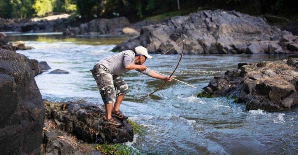 fish catching with arrow